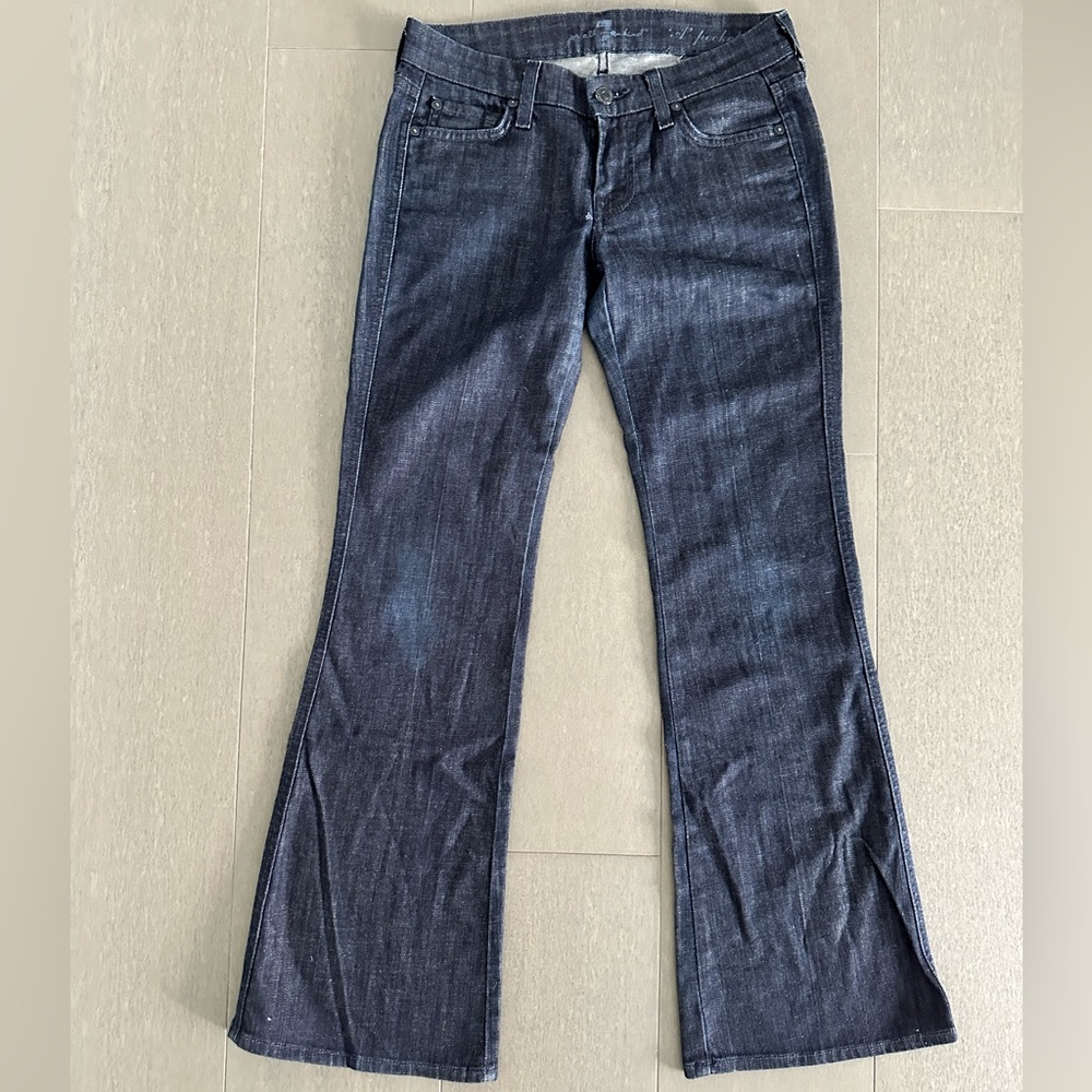 7 for all Mankind. boot cut jeans. Size 25